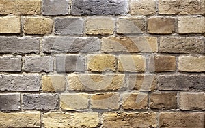 Background of brown building bricks. A wall of bricks