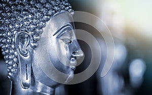 The background of the Buddha is energetic, mysterious and beautiful. Some Buddha images that emerge from darkness and light. Leave