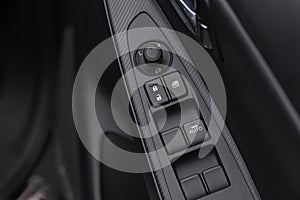 Background of car lock / unlock buttons and window buttons.