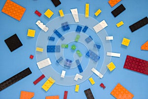 Background for children`s site, for the menu. Children`s constructors on blue. Multi-colored cubes. Games for motor developing mem