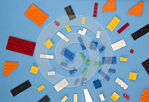 Background for children`s site, for the menu. Children`s constructors on blue. Multi-colored cubes. Games for motor developing mem