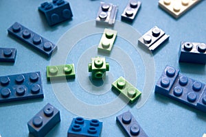 Background for children`s site, for the menu. Children`s constructors on blue. Multi-colored cubes. Games for motor developing m