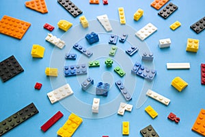 Background for children`s site, for the menu. Children`s constructors on blue. Multi-colored cubes. Games for motor developing m