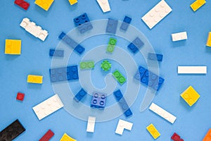 Background for children`s site, for the menu. Children`s constructors on blue. Multi-colored cubes. Games for motor developing m