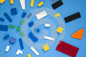 Background for children`s site, for the menu. Children`s constructors on blue. Multi-colored cubes. Games for motor developing mem