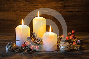 Background for Christmas or Advent with festive burning candles.
