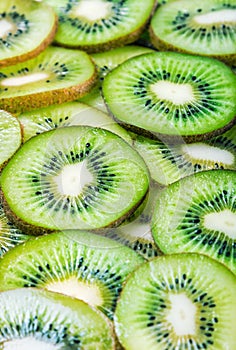 Background with citrus-fruit of Kiwi slices