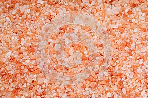 Background of coarse pink Hymalayan salt view from above