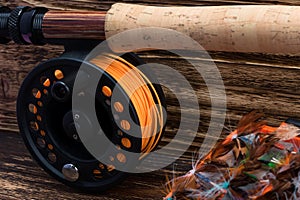 Background of coils for fishing rods, close-up view