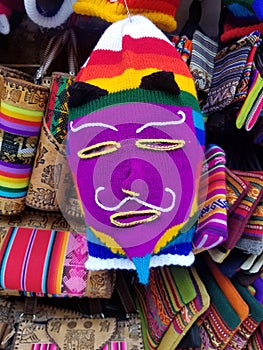 Background of colored fabrics and a traditional mask photo