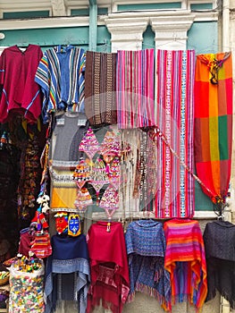 Background of colored fabrics and a traditional mask photo