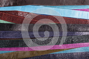 Background - colored leather belts.