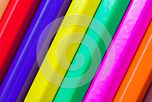 Background of colored pencils. Colored pencils close-up.
