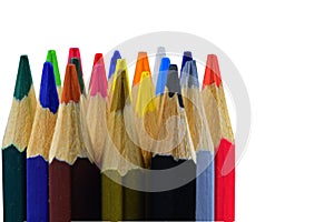 Background of colored pencils for creativity. Close up of an assortment of colored pencils tips on white background