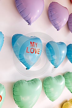 background of colorful balloons in the shape of heart. Love concept. Holiday Object, Birthday, Valentines Day, Wedding