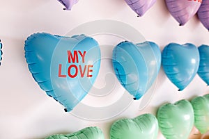 background of colorful balloons in the shape of heart. Love concept. Holiday Object, Birthday, Valentines Day, Wedding