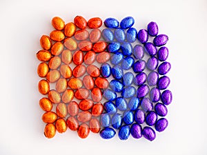 Background of colorful chocolate easter eggs