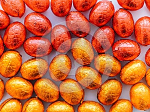 Background of colorful chocolate easter eggs