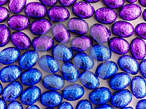 Background of colorful chocolate easter eggs