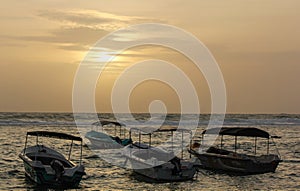 Background Colorful fishing boats and trawlers at a sea in Sri Lanka