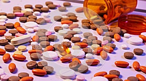 Background of colorful multi-vitamin pills, tablets and capsules