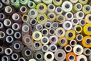 Background of colorful spools of thread