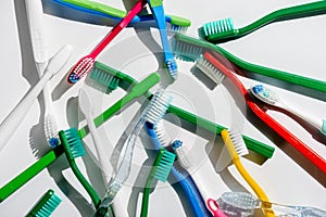 Background with colorful toothbrushes for morning hygiene