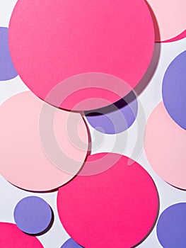 Background of colourful paper circles in Memphis geometric style