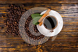 Background composed of coffee beans on wood table