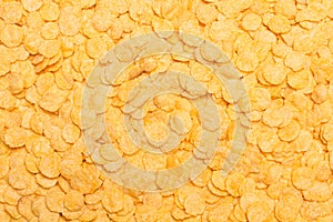 A background of corn flakes in a close up view