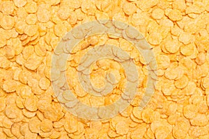 A background of corn flakes in a close up view