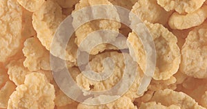 Background of corn flakes rotating close up