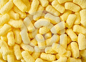 Background of corn sticks close-up. Top view