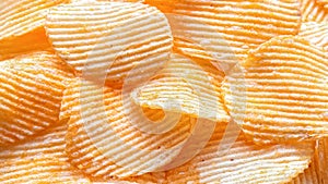 Background of corrugated potato chips with lobster