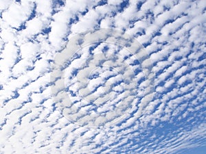 Background of cottony clouds.