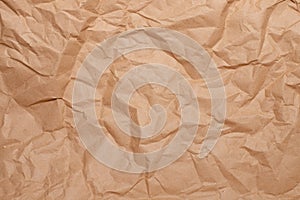 background of crumpled brown paper close-up, place for your text