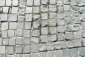 background with cubic stone from alexandru park ioan cuza from bucharest. top view