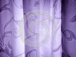 A background with curvy lines and violet tint.