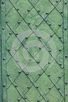 Background of decorated door with wrought iron