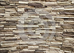 The background of a decorative stone wall. Interior.