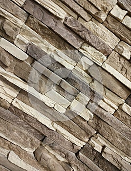 The background of a decorative stone wall. Interior.