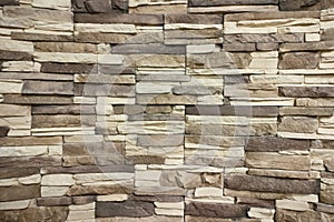 The background of a decorative stone wall. Interior.