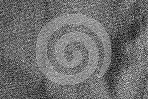 Dark grey fabric texture. Background with delicate striped pattern.
