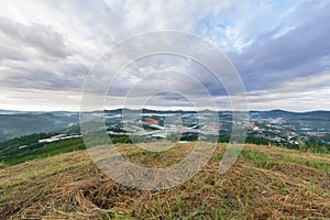 Background with dense fog and magic light at the sunrise. The coffee farm and small houses in brilliant sunshine part 9