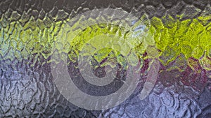 Background from a detail of opaque glass with a green horizontal strip