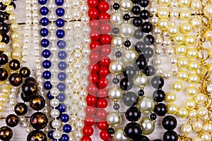 Background of different beads necklaces