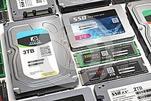 Background from different data storage devices. Hdd, ssd and ssd m2 iin a row photo