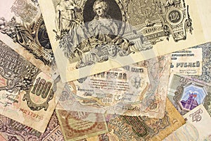 Background of different vintage banknotes of Russia of different denominations close-up