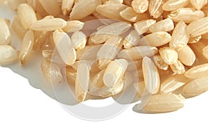 A background of dry brown rice grains showcases the integral, uncooked texture