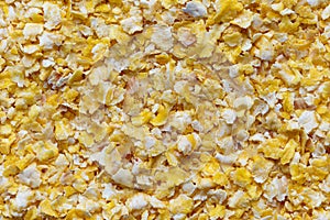 Background of dry flaked corn. photo